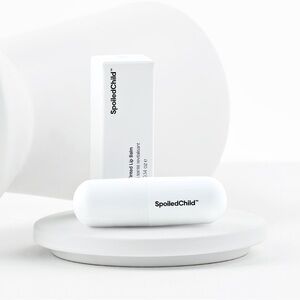 Conditioning tinted lip balm - Spoiled Child. Brand New in Box